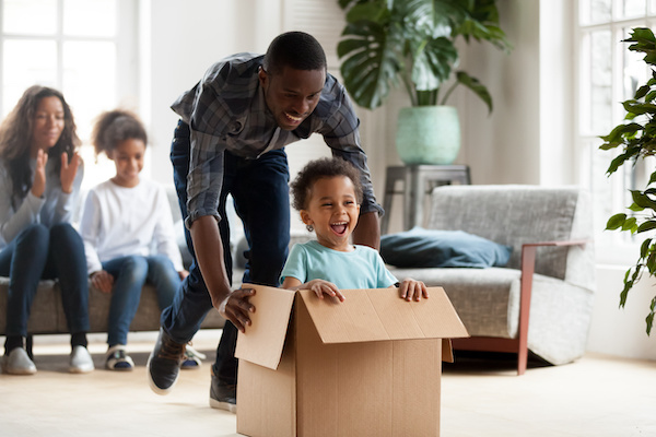 family with moving boxes