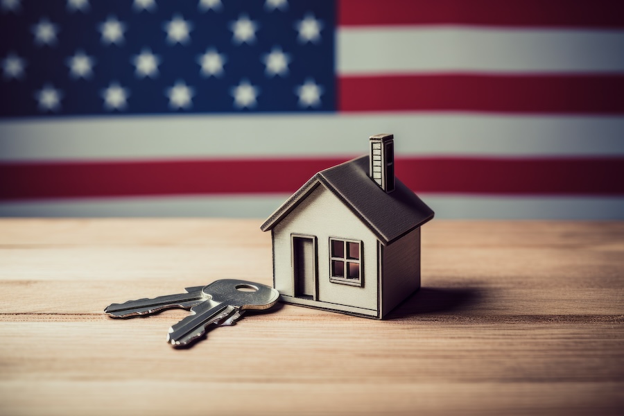 Model house and keys on a table, representing VA loan home ownership